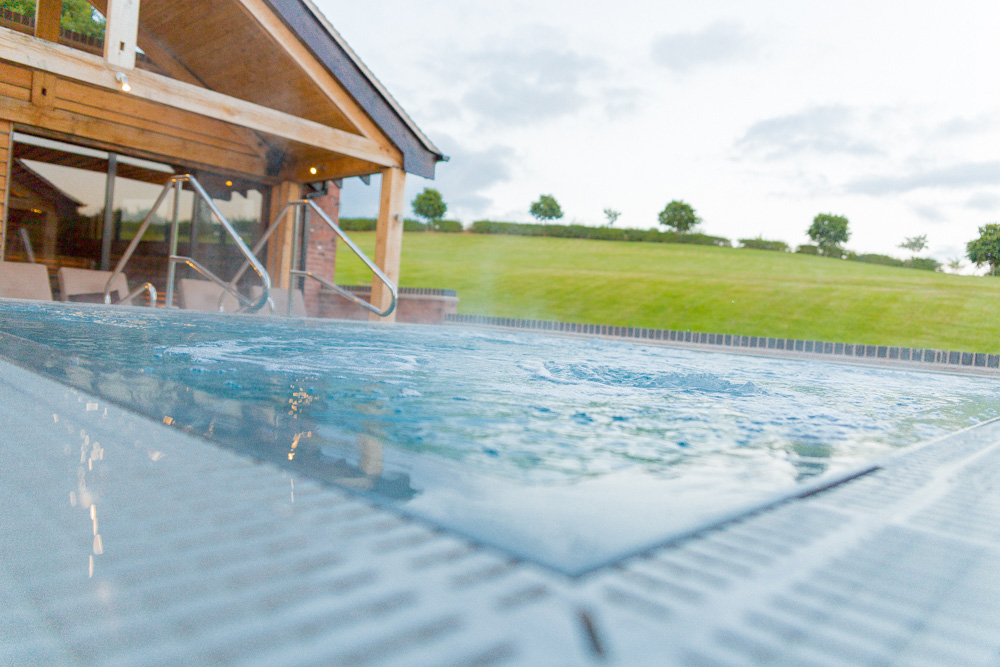 Outdoor hydrotherapy pool at Moddershall Oaks