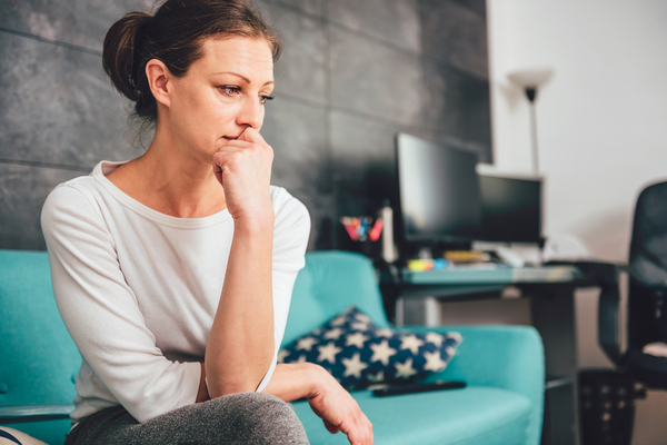 woman looking worried cbd oil for sleep