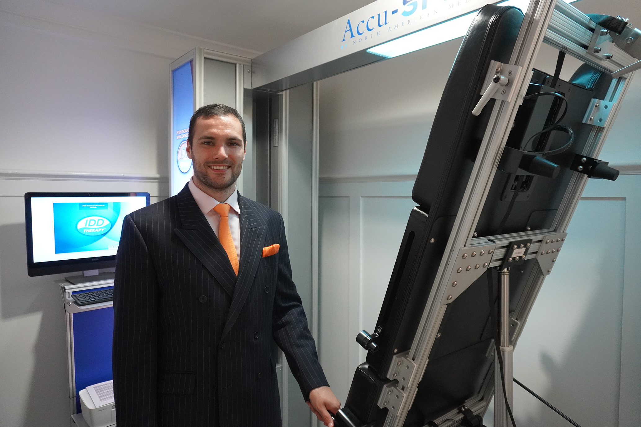 Michael from the Mayfair clinic in front of the IDD machine