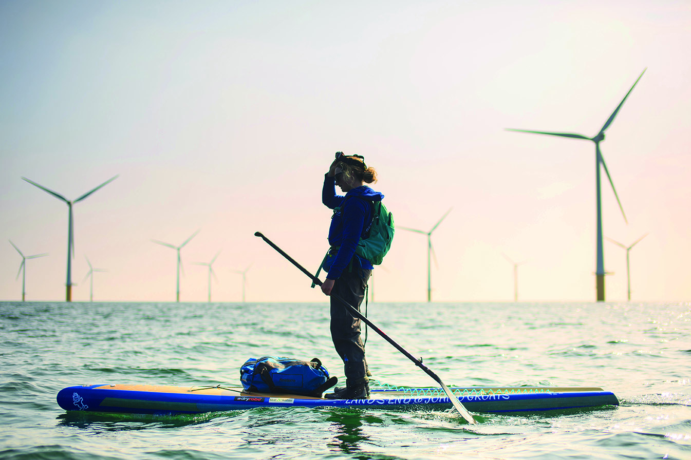 Mental health benefits of paddleboarding. Cal on her board