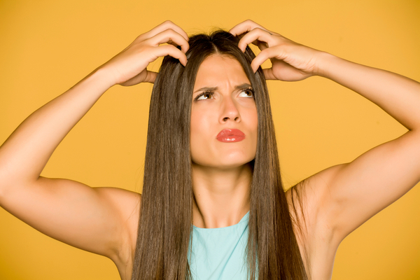 woman with itchy scalp psoriasis