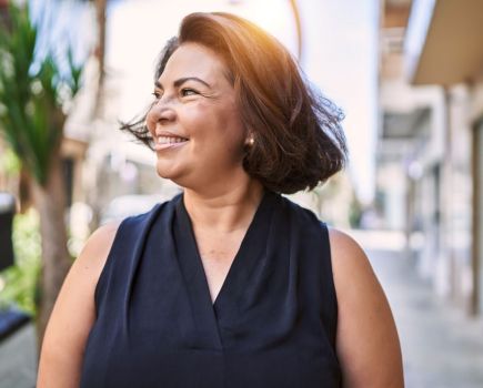 woman happy middle age menopause