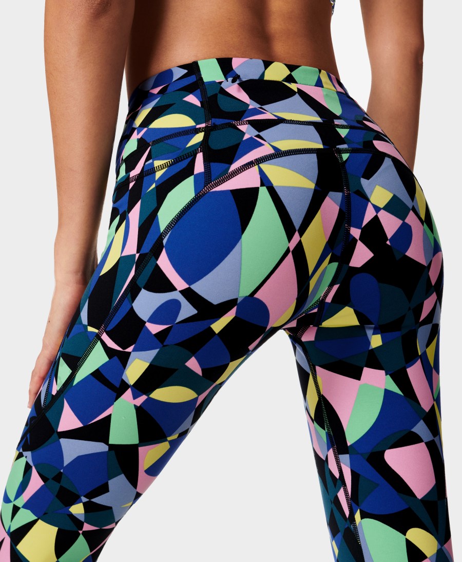 The Sweaty Betty Power leggings in Blue Prism Camo Print, which help hug your curves and hold you in. 