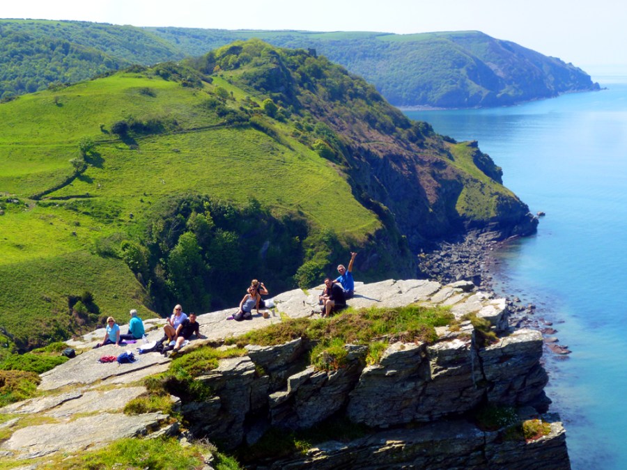 Image of Yeotown Walking holidays - people walking along a clifftop in Devon.