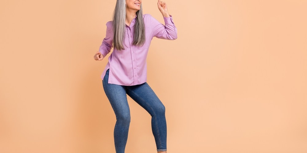 mature woman happy wearing jeans
