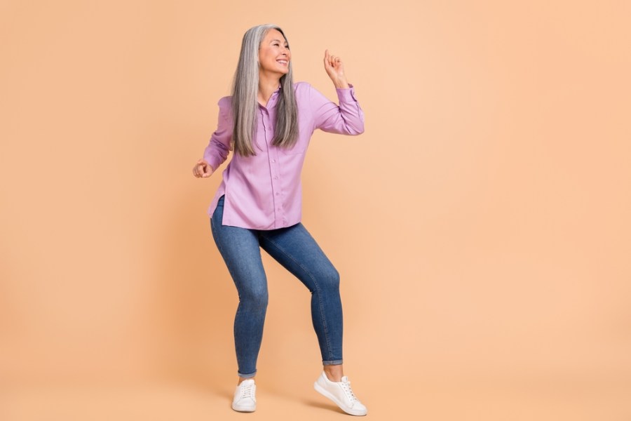 mature woman happy wearing jeans