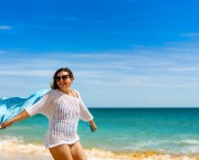 woman summer beach health wellness concept