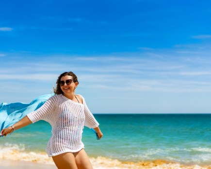 woman summer beach health wellness concept