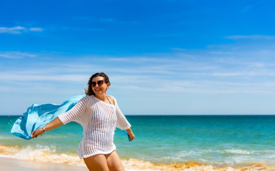 woman summer beach health wellness concept