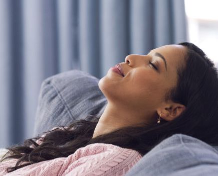 woman sleeping during day tired from menopause sleep problems