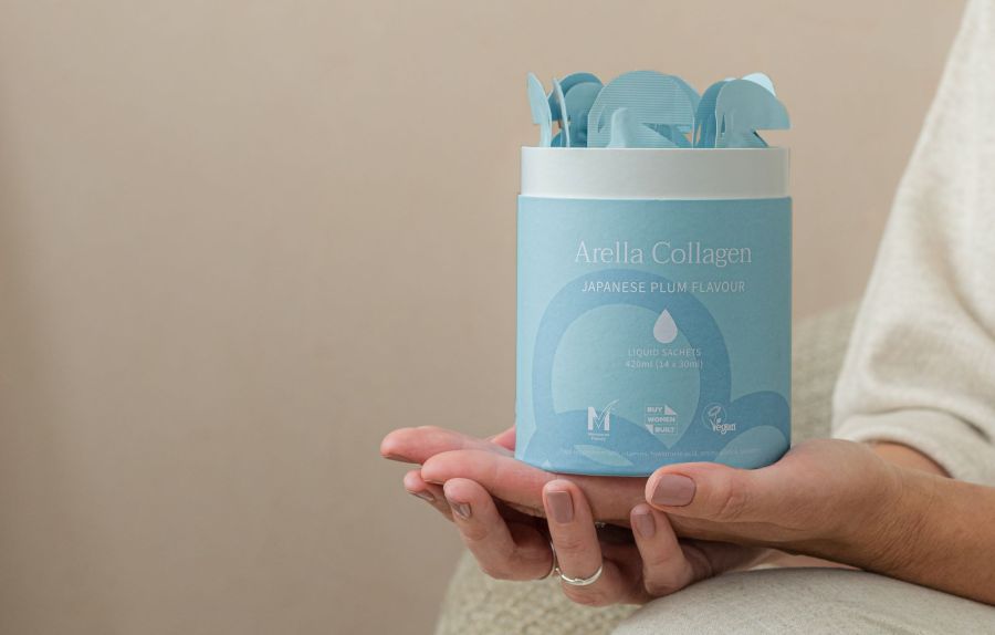 hands holding Arella Collagen