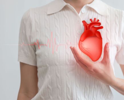 woman heart health high cholesterol concept