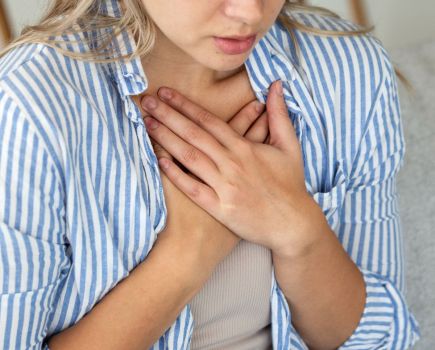 woman with heartburn