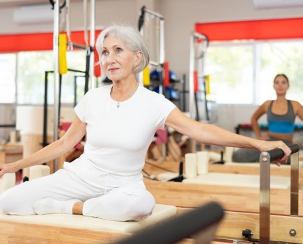 Mature woman doing Pilates